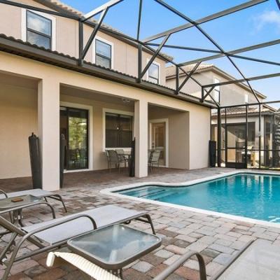 Retreat At ChampionsGate with screened lanai and heated pool
