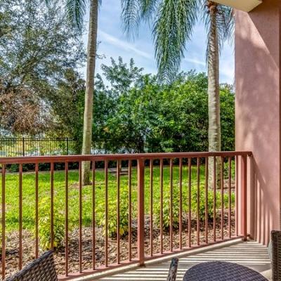 Private balcony with pond view at Vista Cay, Orlando, FL